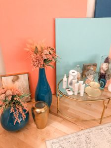 Clinic with Blue vases with pink flowers and gold furniture