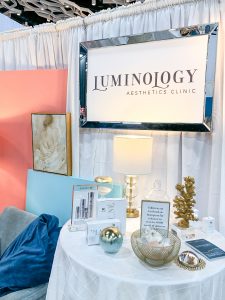 Luminology trade show booth signage and logo